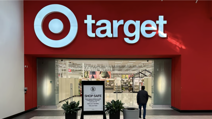 A person heads into a Target store Thursday, Jan. 11, 2024, in Lakewood, Colo. (AP Photo/David Zalubowski, File)